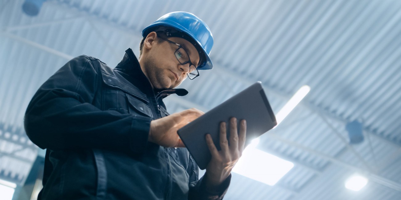 Engineer with tablet computer