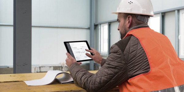 Workman using tablet computer